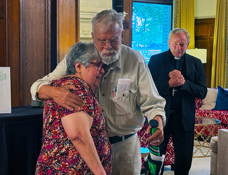 Maria and Father Ted Baenziger, CSB, at her retirement party