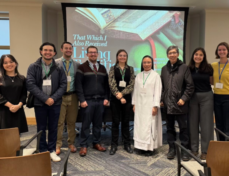 UST student pose with UST professor Dr. Kevin Stuart and Sr. Theresa Marie Chau Viet Nguyen, O.P. at the conference.