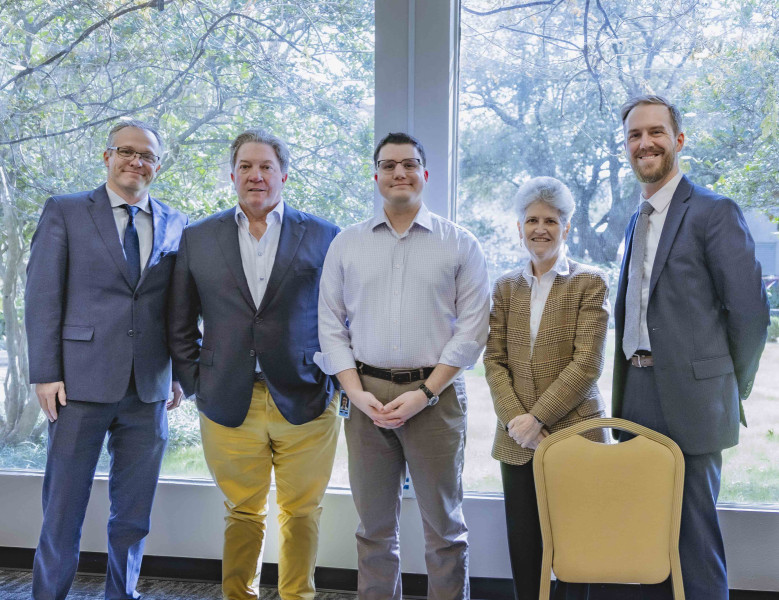 Dr. Michael Boler, Sean Tracey, Andrew Troxler, Lori Gallagher and Dr. Martin Lockerd enjoy the discussion on a career grounded in a philosophical education on February 3, 2026 in the Honors Seminar Room at University of St. Thomas.