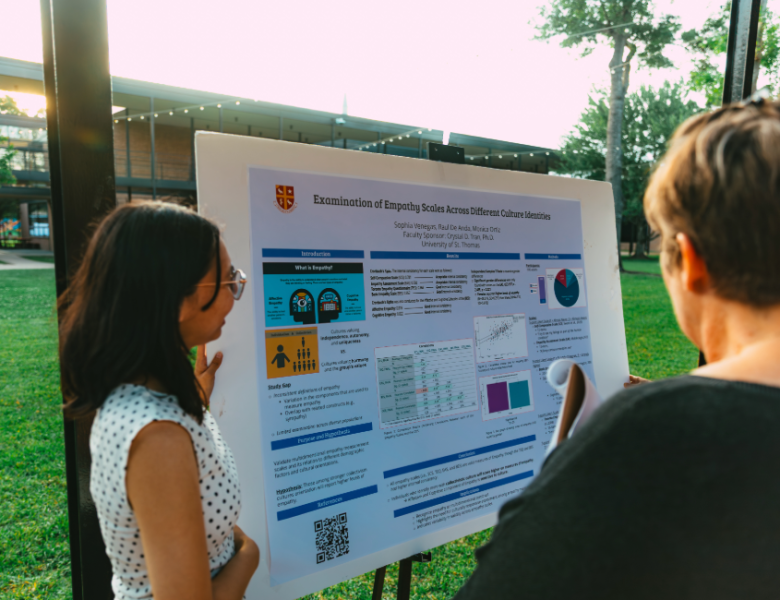 Dr. Jo Meier Marquis looks at a student research project.