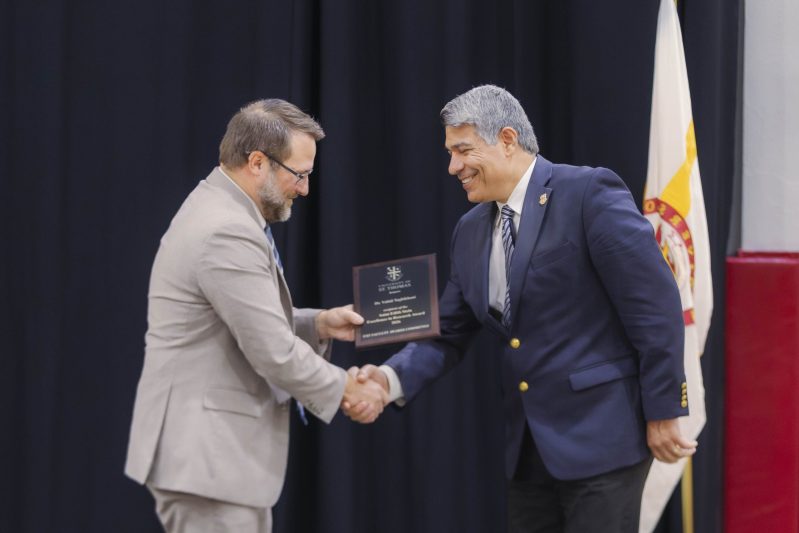 Dr. Joe Wysocki and Dr. Vahid Taghikhani at University of St. Thomas' Opening Day 2026.